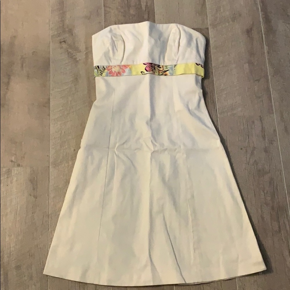 Ivory strapless dress with tropical floral sash